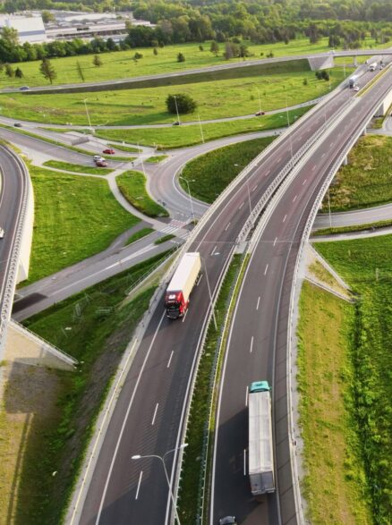 cars-moving-on-transport-road-junction-in-city-ae-2025-03-13-03-02-02-utc